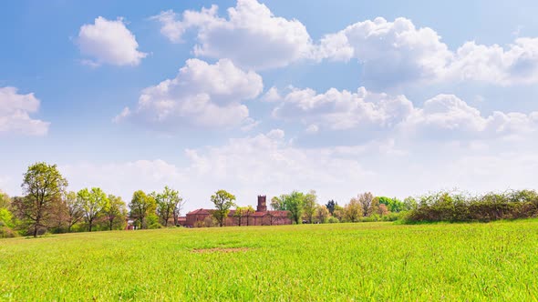 Venaria Reale, Italy. Meadow in La Mandria Park with the Royal Castle in the background. alt