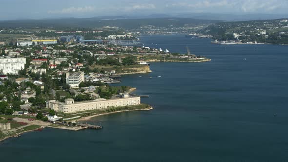 Aerial view of the city on the shore of the Strait and the sea