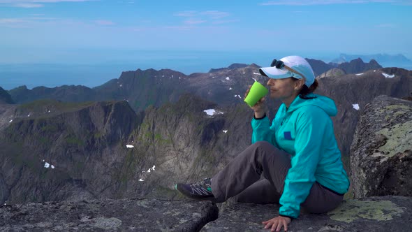 A Girl Is Drinking Tea in the Mountains alt