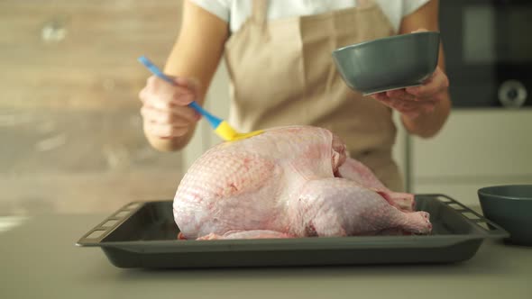 Close up Preparing Turkey in Kitchen