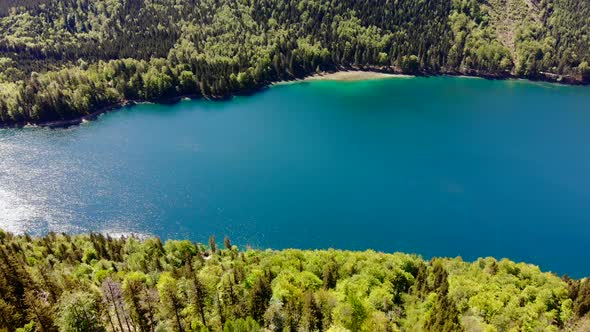 Beautiful view from the Signalkogel to the Lake Langbathsee and Mountains drone video alt