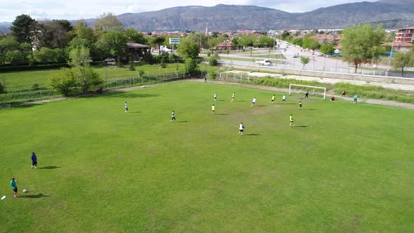 Children Playing Football Training School