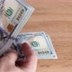 In hands bundle hundred dollar bills, counting money, business and finance. - VideoHive Item for Sale