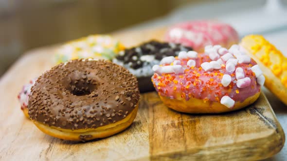 Chocolate Marshmello and Candy Donuts on a Retro Baking Tray alt