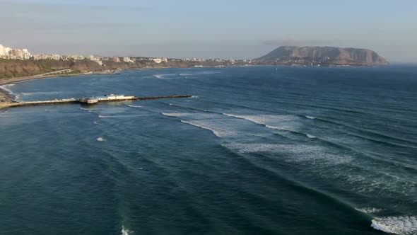 Panoramic View OfLa Rosa Nautica Restaurant With Scenic Blue Sea In Miraflores, Lima, Peru. - aeria alt