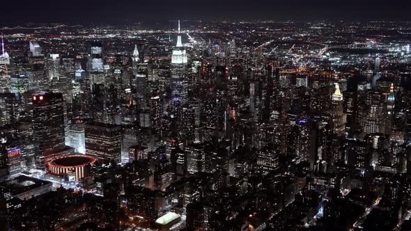 The Midtown Manhattan at night as seen from a helicopter