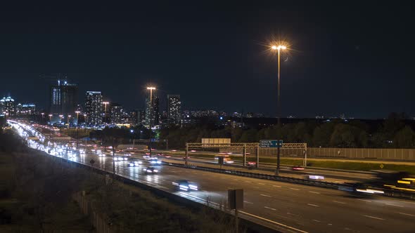 Motion Time Lapse Of Night Time Busy City Highway 