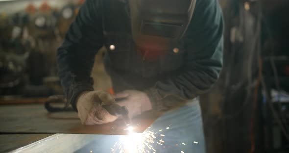 Locksmith Cuts Metal with a Plasma Cutter Metalcutting By Gas Cutter with Sparks  Prores HQ alt