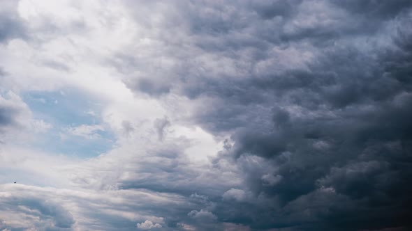 Timelapse of Gray Cumulus Clouds Moves in Blue Dramatic Sky Cirrus Cloud Space alt