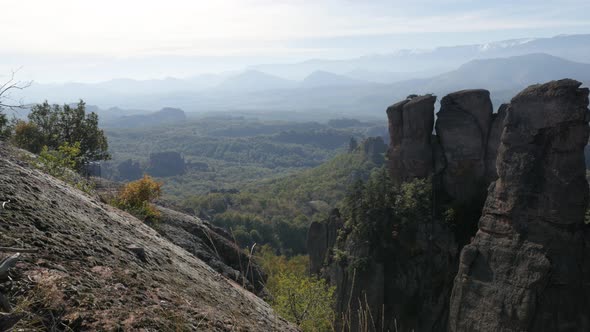 Slow pan on valley with stone formations in Western Bulgaria 4K 2160p 30fps UltraHD footage - Strang alt