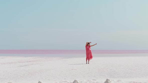 Beautiful Paradise Landscape of Salt Flats on Pink Lake with Beautiful Sky alt