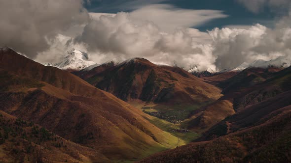 Clouds moving in the Mountains Valley and Village alt