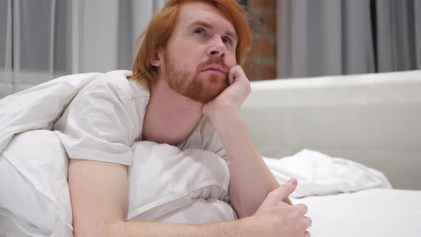 Thinking Redhead Beard Man Relaxing in Bed Brainstorming alt