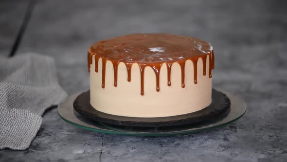 Vanilla Layer Cake with Caramel and Frosting Rotating