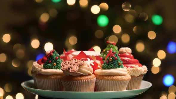 Christmas Cupcakes with Christmas Tree Background