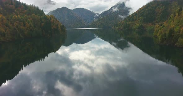 Mountain lake in the clouds. Aerial alt