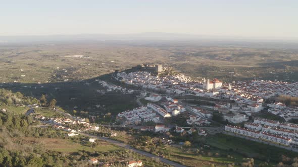 Aerial drone view of Castelo de Vide in Alentejo, Portugal from Serra de Sao Mamede mountains alt