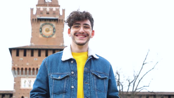 Slow motion proud successful man outdoor smiling looking camera strong alt