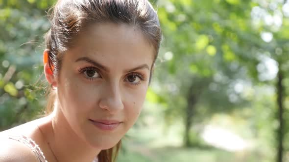 Young woman outdoor portrait slow motion video alt