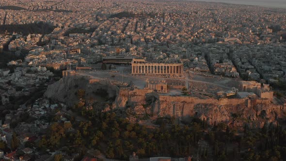Aerial Perspective Circling Acropolis of Athens in Golden Hour Sunset Light alt