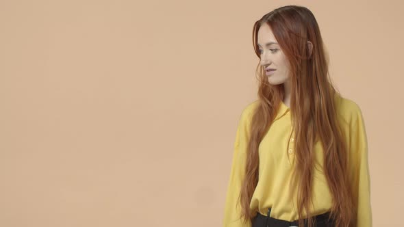 Gorgreous Redhead Girl Long Natural Ginger Hair Turn Face Left at Blank Empty Space for Promo Found alt