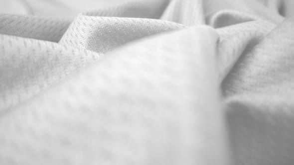 Close Up Detailed Cloth Texture of Shiny Spandex Cloth with Dolly Shot alt