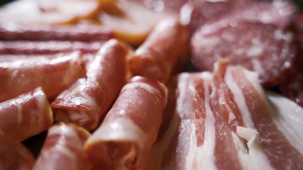 Salami and Chorizo Sausage Close Up on Stone Serving Board alt