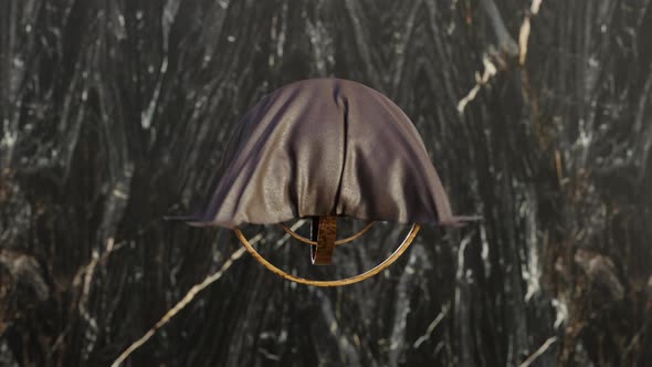 3D animation loop of leather fabric falling on rotating rings of various sizes alt