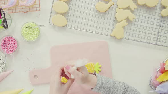 Step by step. Flat lay. Decorating Easter sugar cookies with royal icing alt