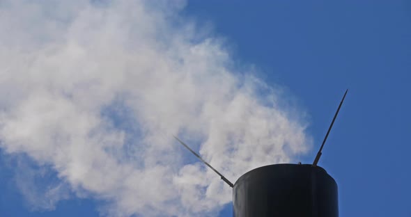 Smoke and air pollution from a chimney in France. alt