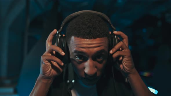 The Player Has His Headphones on and is Ready for an eSports Tournament alt