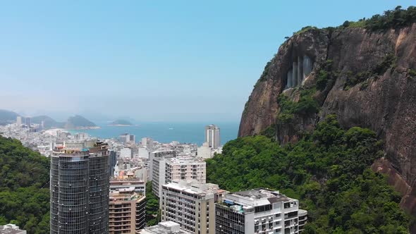 Hills, Mountains, Buildings, Skyscrapers, Ocean (Rio De Janeiro, Brazil) Aerial View, Drone footage alt