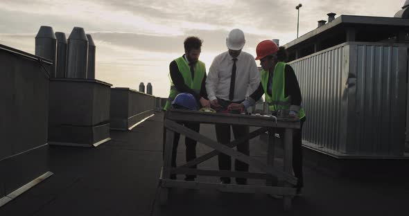 Two Good Looking Construction Workers , One Mixed alt