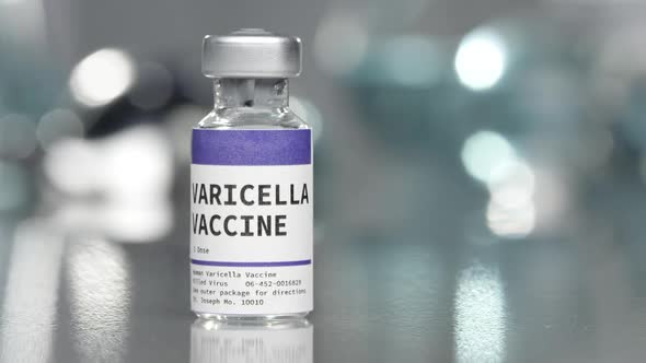 Varicella Vaccine Vial In Medical Lab With Syringe, Stock Footage 