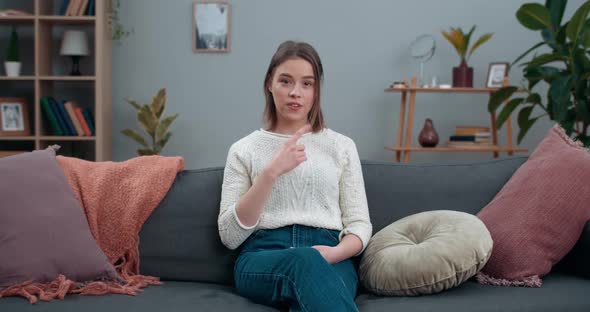 Millennial Woman Showing with Deaf-mute Sign Language I'm Deaf. Female Person with Hearing Loss