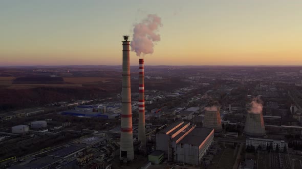 Pipes Pollute the Atmosphere of the Industry with Smoke Pollution Near the City alt