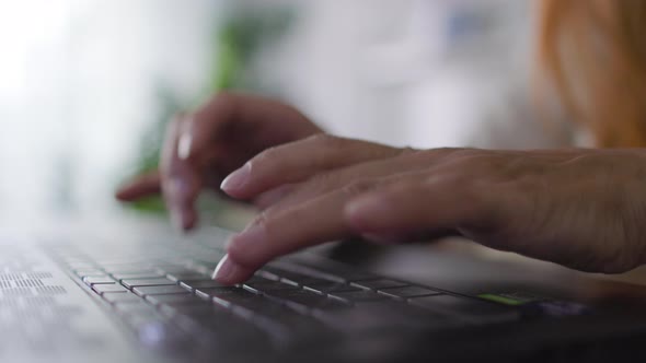 Beautiful Adult Woman With Red Hair Works Laptop At Home alt