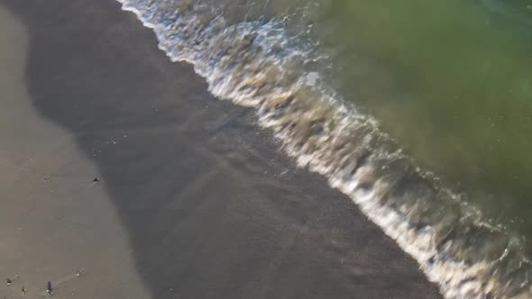 Aerial View Over Stormy Sea or Ocean with Beautiful Waves Pattern