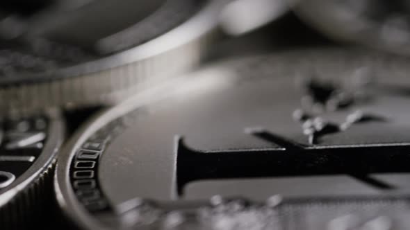 Rotating shot of Bitcoins  alt