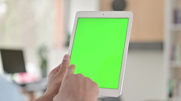 Chroma Key, Rear View of Young African American Man Using Tablet alt