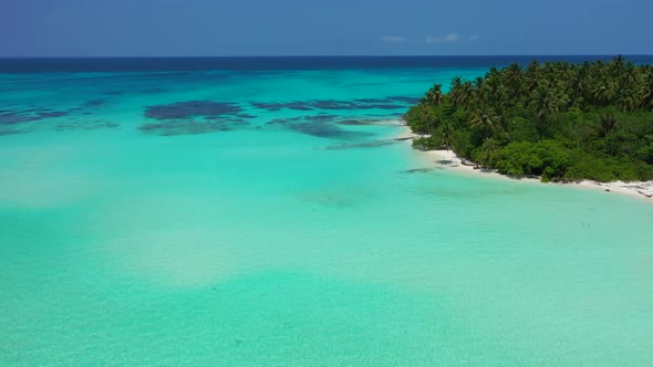 Aerial texture of luxury coast beach holiday by blue green water and white sand background of a dayo alt