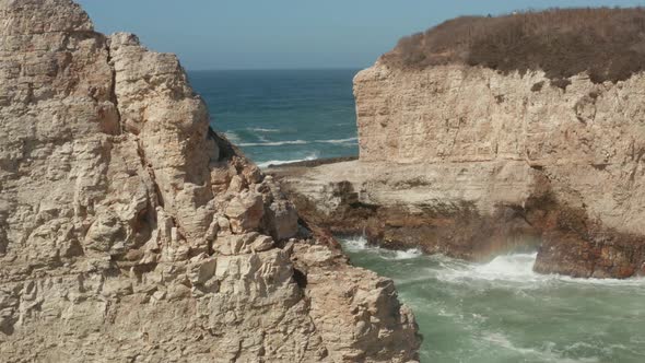 Aerial view of ocean at Shark Fin Cove on High way 1 in Northern California alt