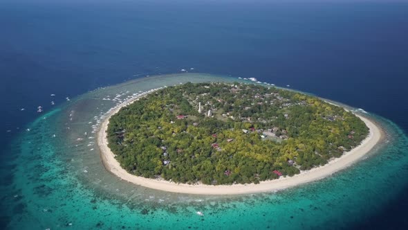 Aerial lateral tracking shot panning right of Balicasag Island, Bohol, the Philippines alt