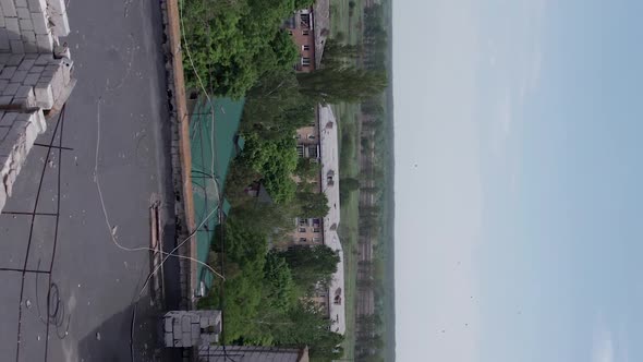 Vertical Video of a Destroyed Residential Building During the War in Ukraine alt