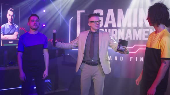 Announcer Asking Cyber Sportsmen to Shake Hands alt