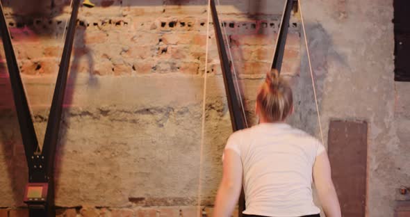 Determined Female Athlete Doing Workout In Gym alt