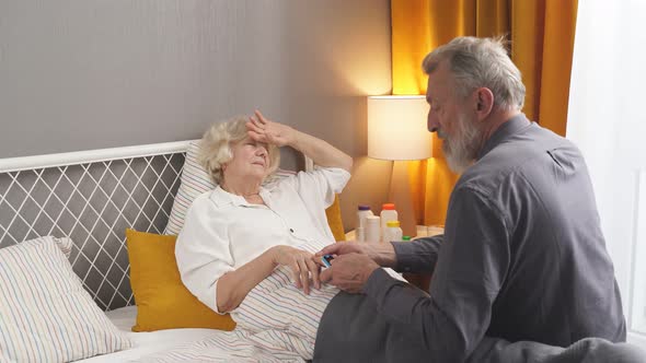 A Man Takes Care of His Wife alt