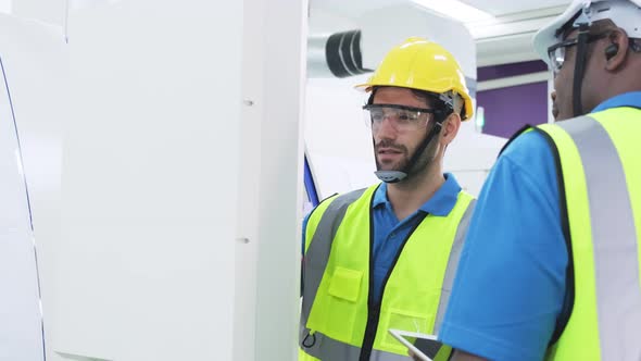 Group of worker people wear protective safety equipment helmet and glasses in production factory. alt