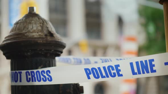 White Ribbon with the Inscription Police Line - Do Not Cross alt