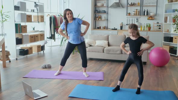 Pregnant Mother and Child Go in for Sports at Home Online